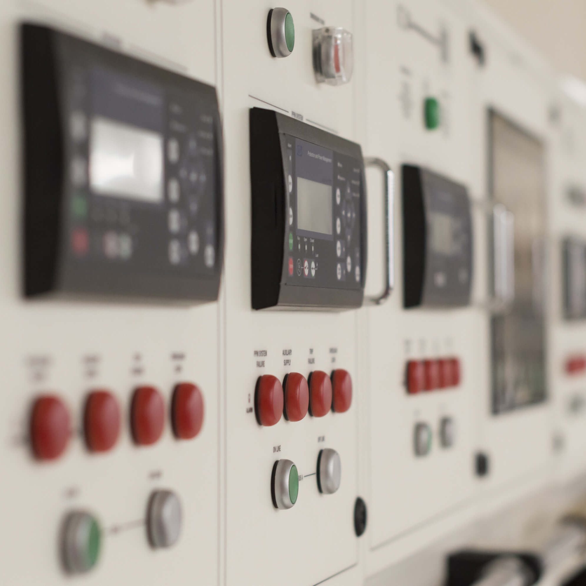 stock-photo-main-electric-control-board-inside-a-factory-blurred-picture-666094450